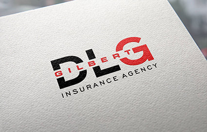 ​Gilbert DLG Insurance Agency logo printed on a paper